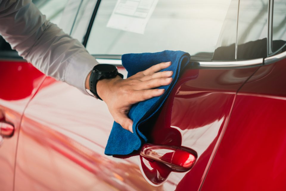 Man polishing his car