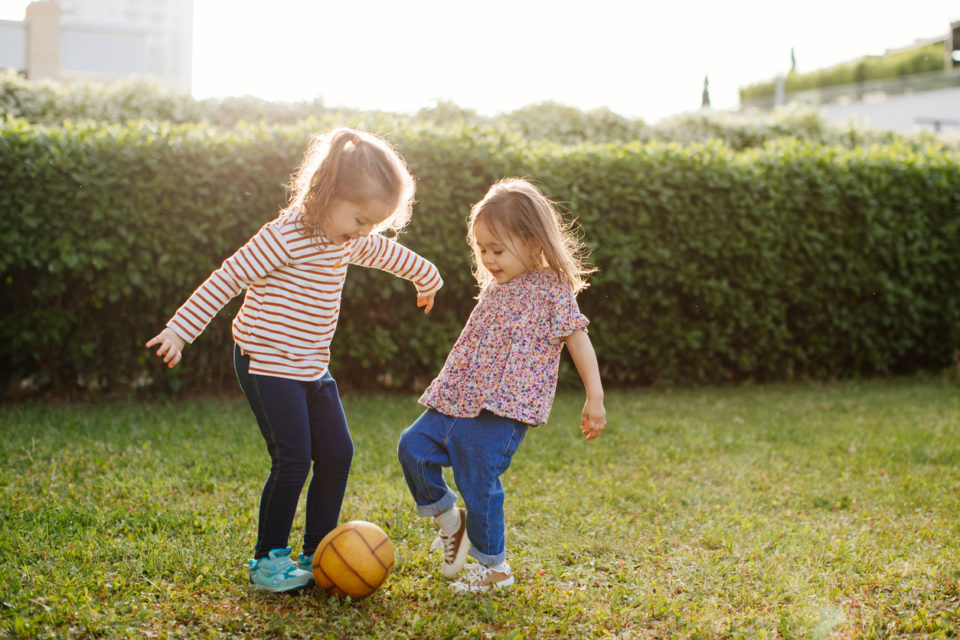 Children running and smiling.