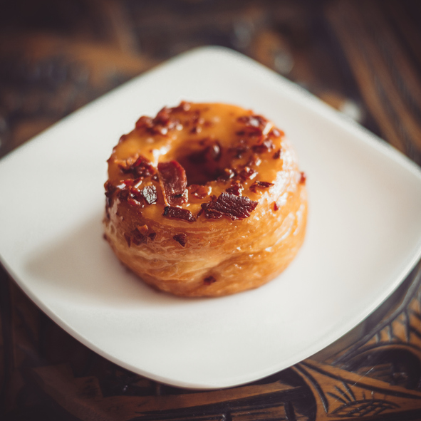 Bacon Maple Cronut on a white plate